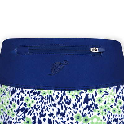 Blue and floral-patterned waistband with a visible Turtles and Tees brand logo on a white background