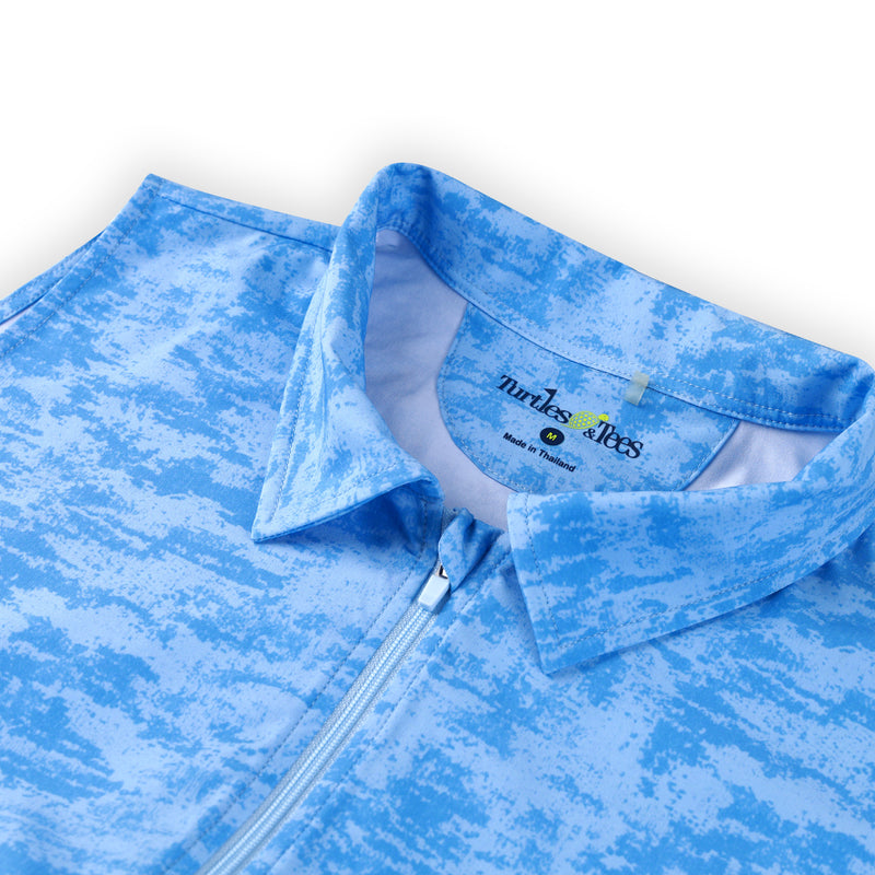 The collar of a Turtles and Tees blue polo romper