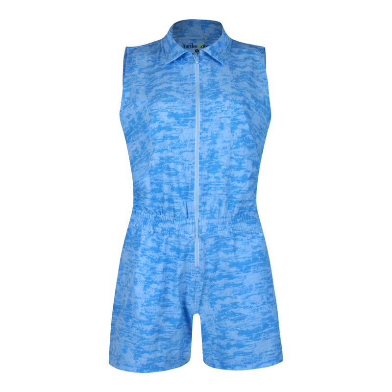 A product image of a Turtles and Tees womens blue zip up polo romper