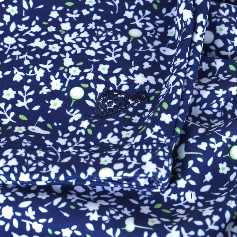 Embroidered logo on Turtles and Tees blue floral long sleeve toddler dress