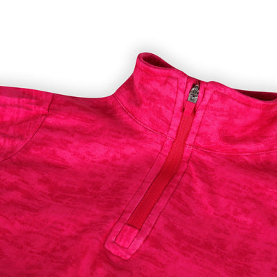 Quarter zip collar of a Turtles and Tees girls hot pink long sleeve golf dress
