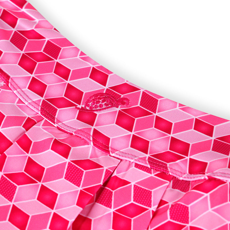 Waistband of a Turtles and Tees pink golf skort with a visible brand logo.