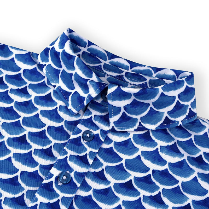 Collar detail of a Turtles and Tees white and blue fish print golf polo