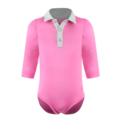 Infant girl's bright pink onesie with long sleeves and a white collared button.