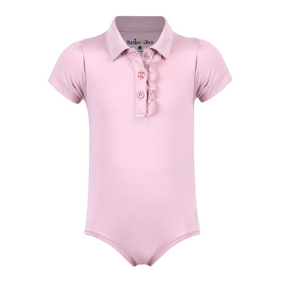 A pink girls onesie with a ruffled button plack